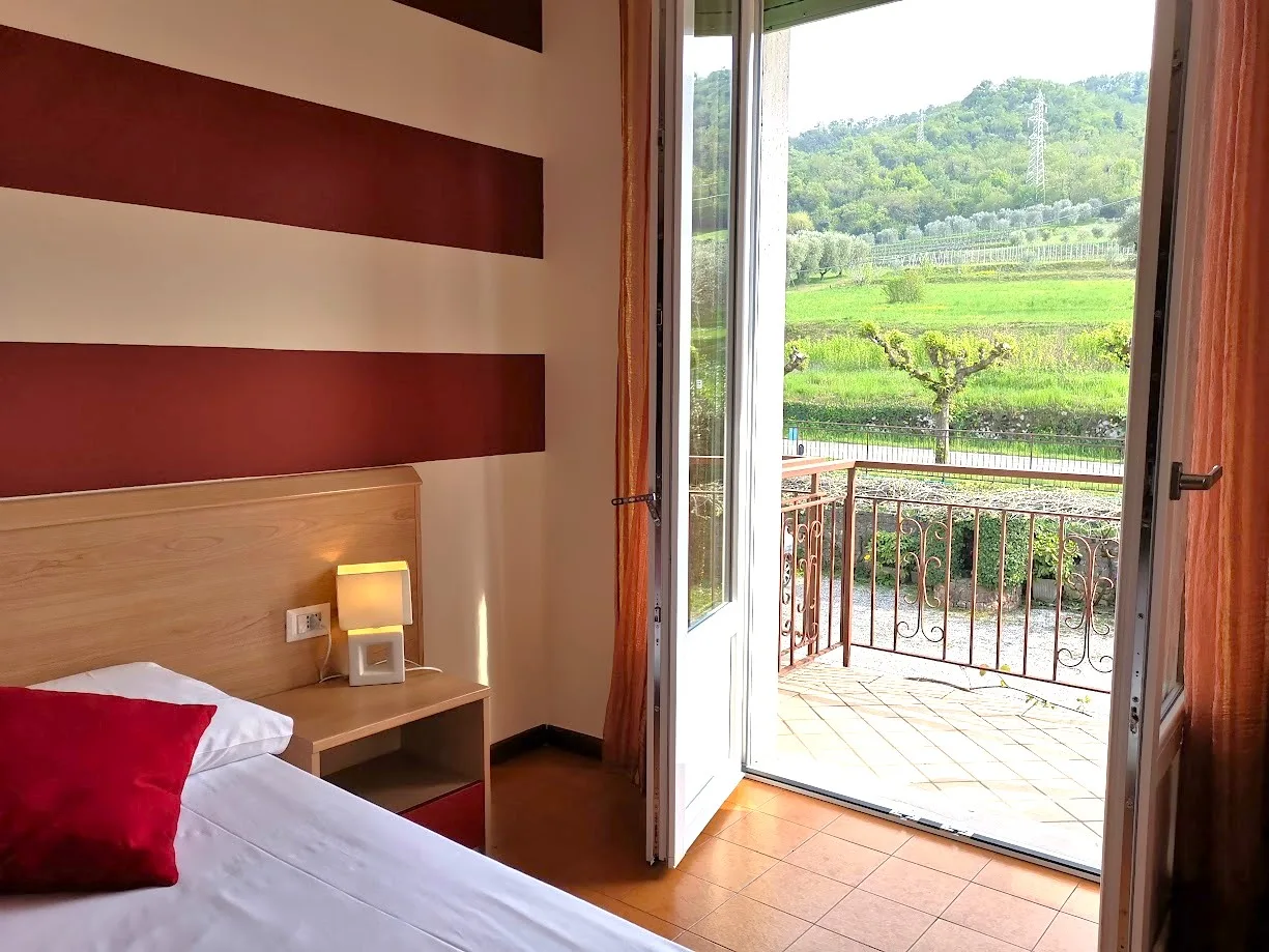 Camera con balcone privato